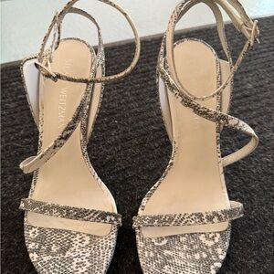 Stuart Weitzman Black and Cream Sandals with Elegant Straps